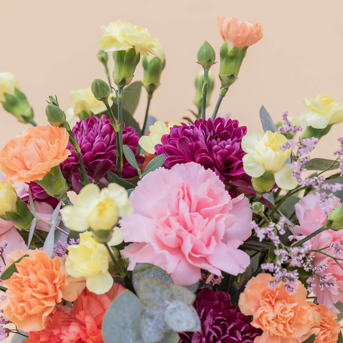 La Chispa - Arreglo con flores amarillas y naranjas