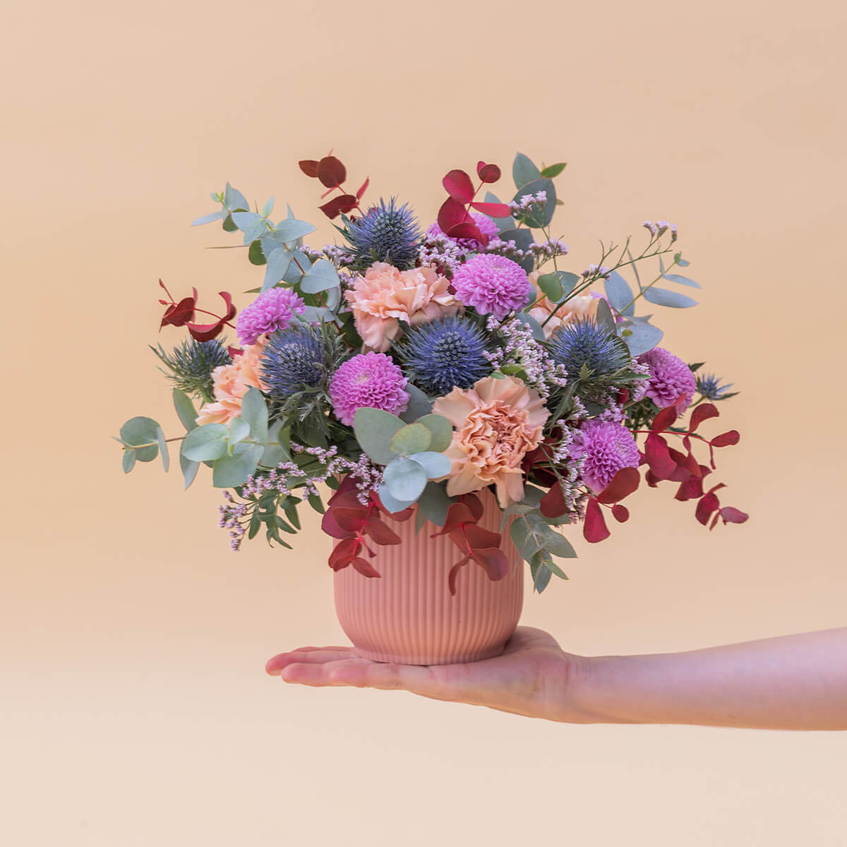 El Guiño  - Arreglo con flores moradas y azules