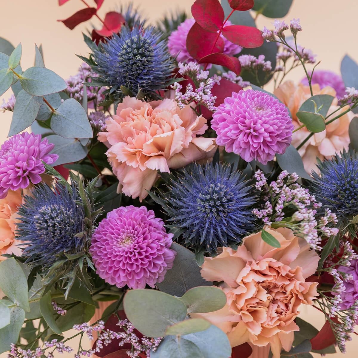 El Guiño  - Arreglo con flores moradas y azules