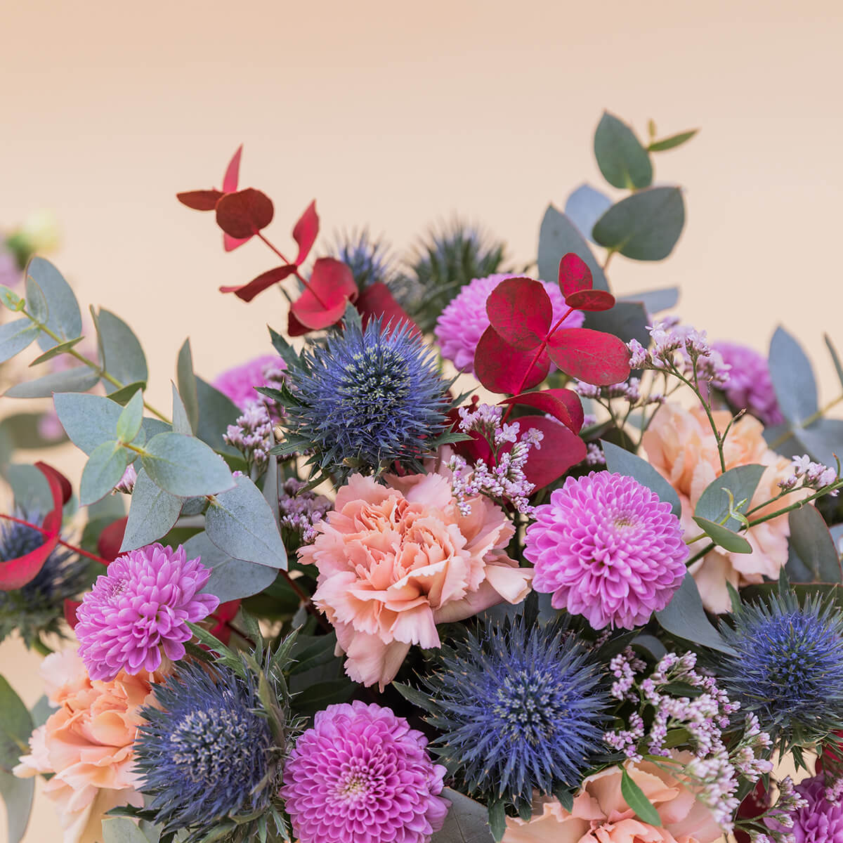 El Guiño  - Arreglo con flores moradas y azules