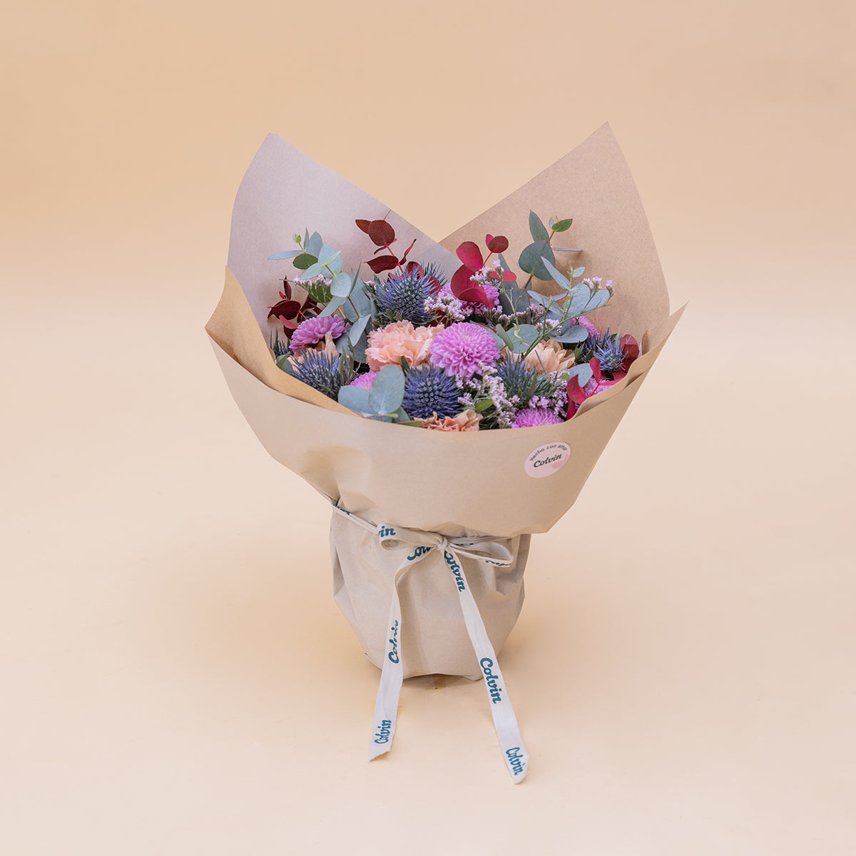 El Guiño  - Arreglo con flores moradas y azules