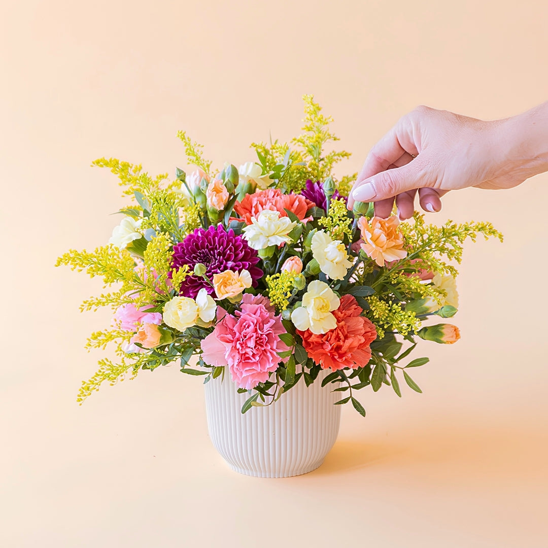 O Faísca - Arranjo com flores amarelas e laranjas