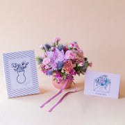 pack guiño con cuaderno y tarjeta gracias sobre fondo crema